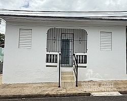 Your New Home in the Town of Añasco, Steps from the Plaza